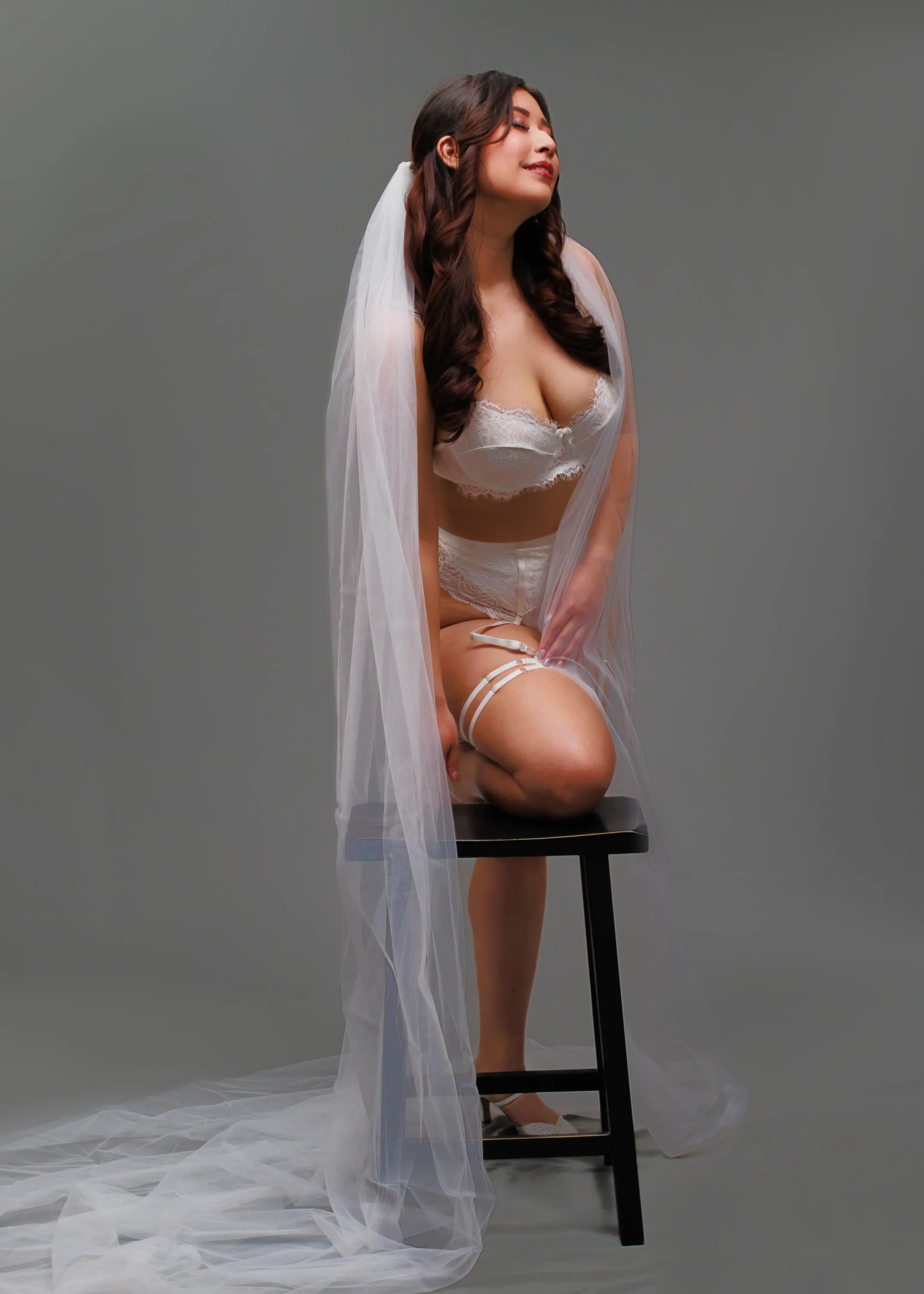 Confident bride during bridal boudoir session