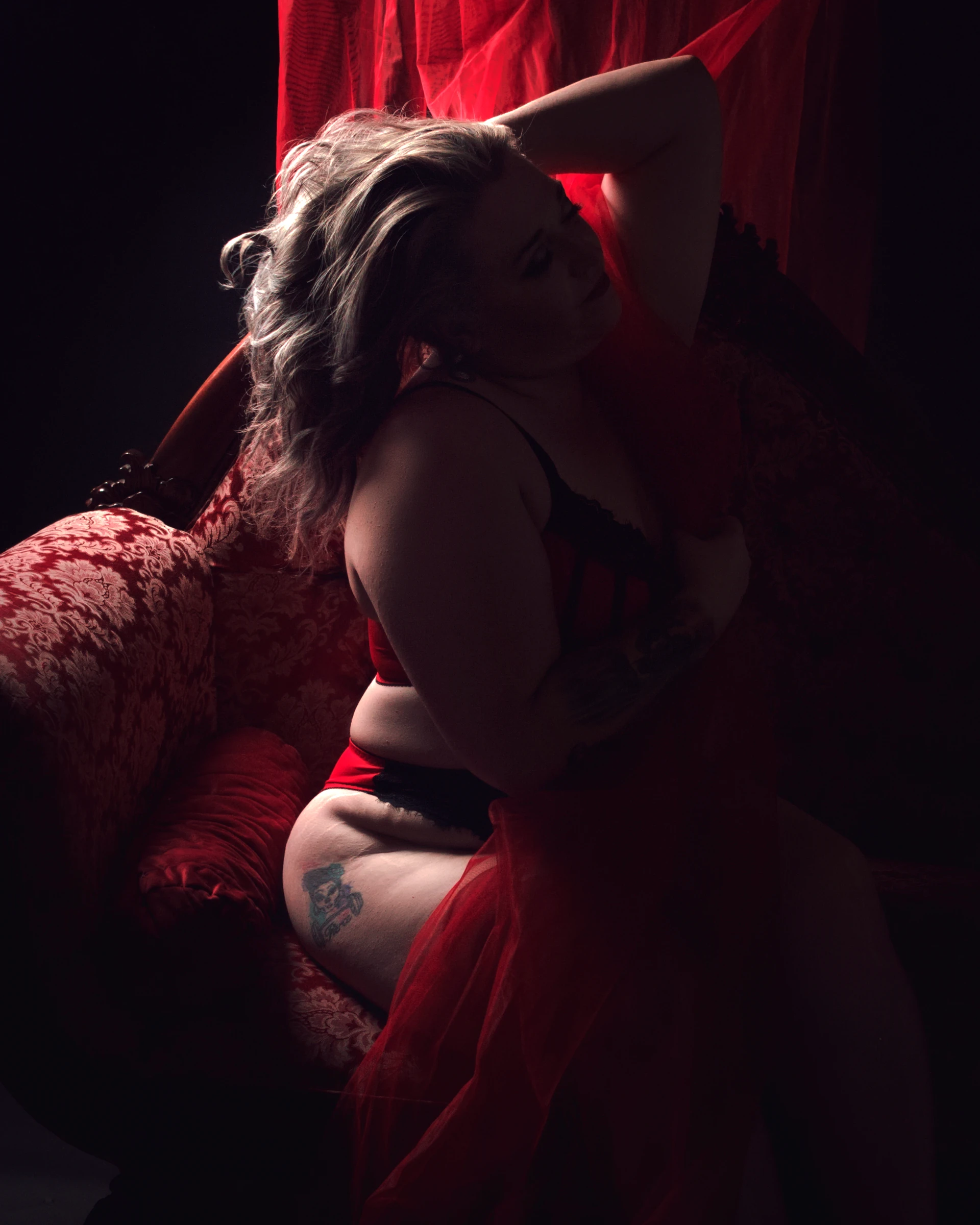 Elegant plus size editorial boudoir portrait for women over 40 in San Antonio