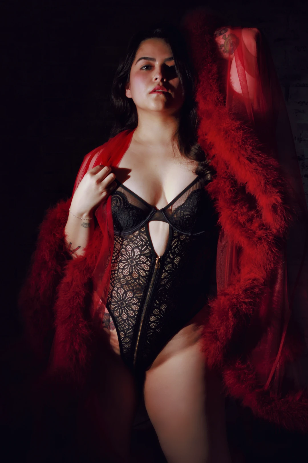 Classic studio boudoir with a red sheer robe in San Antonio